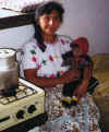 gorra_woman_with_doll.JPG (34643 bytes)